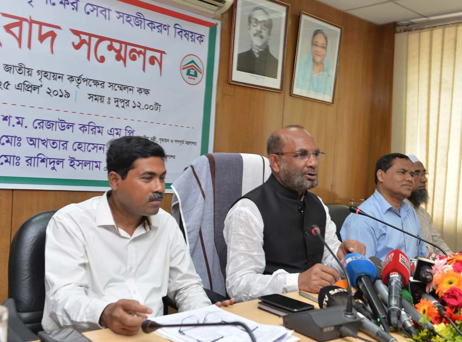 Minister Rezaul Karim, speaking at a National Housing Authority press conference.