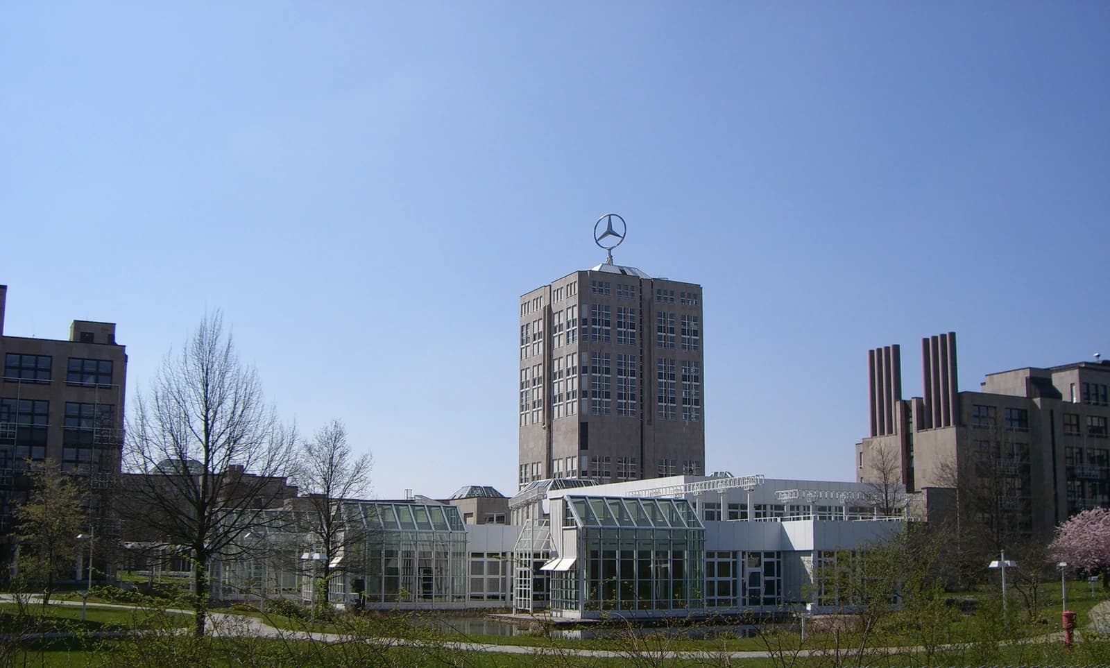 DaimlerChrysler headquarters building with Mercedes-Benz logo atop, Stuttgart, Germany.