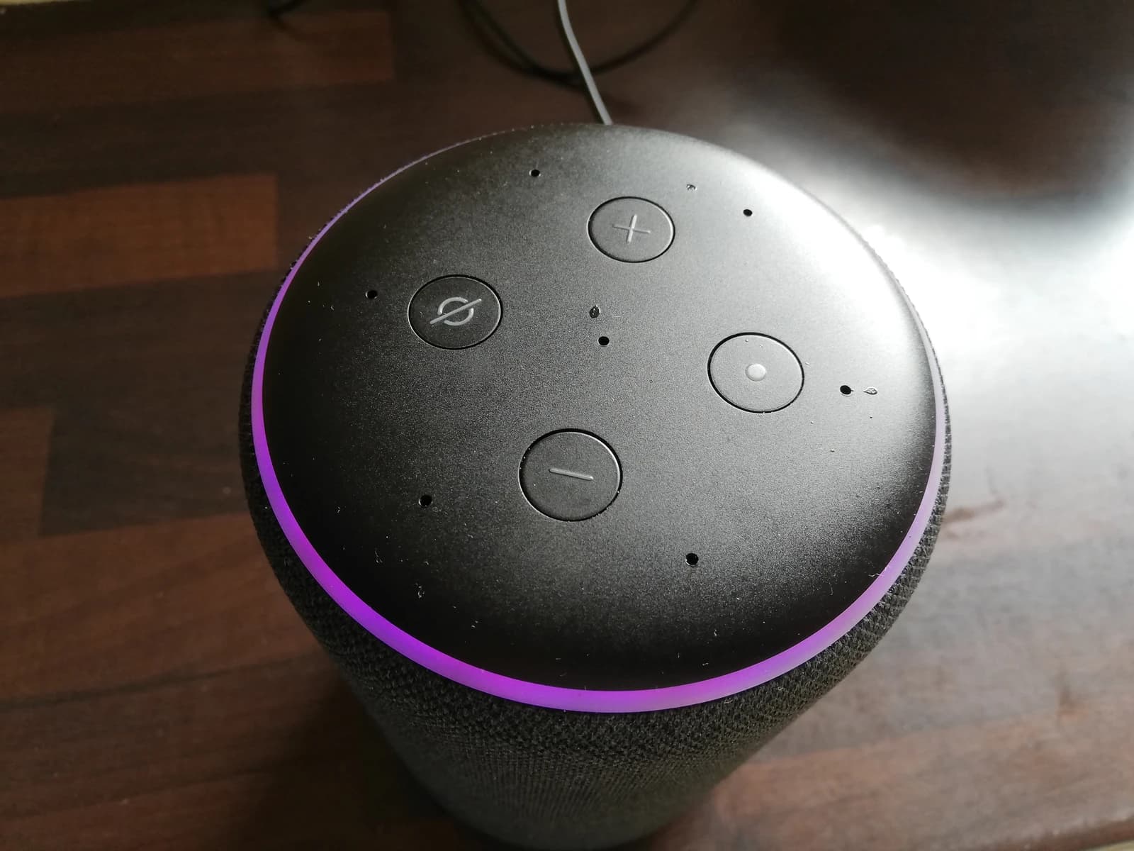Amazon Echo Smart Speaker showing a purple ring light.