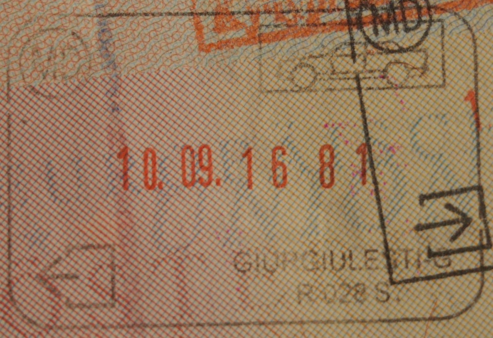 Close-up of a Moldovan passport exit stamp with a date and location clearly visible.