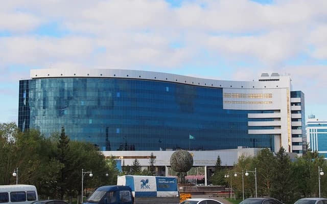 Ministry of Finance building in Kazakhstan, a modern glass and concrete structure.