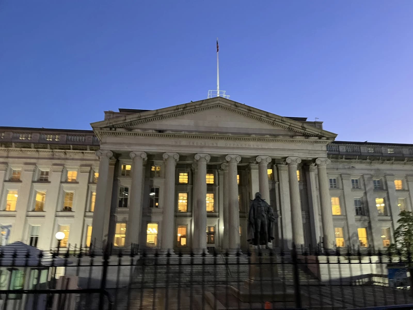 The United States Treasury building in Washington, D.C., seen at dusk.