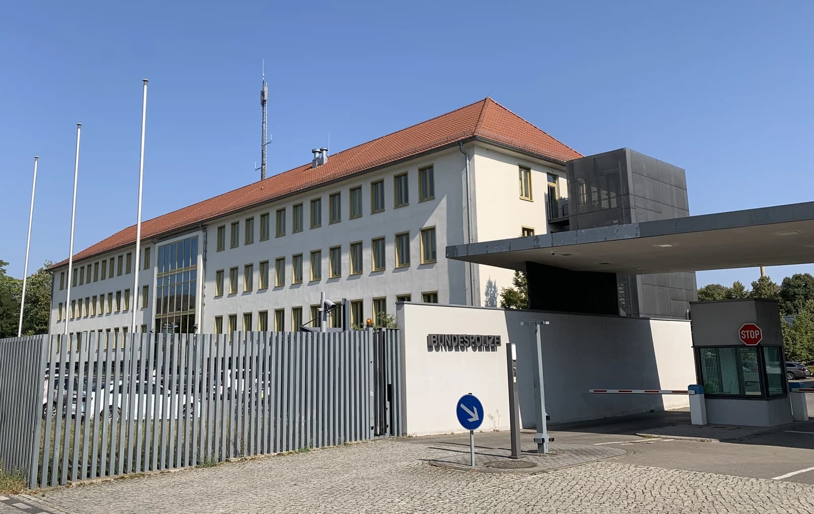 Bundespolizei building with a security gate, visible sign says "Bundespolizei".