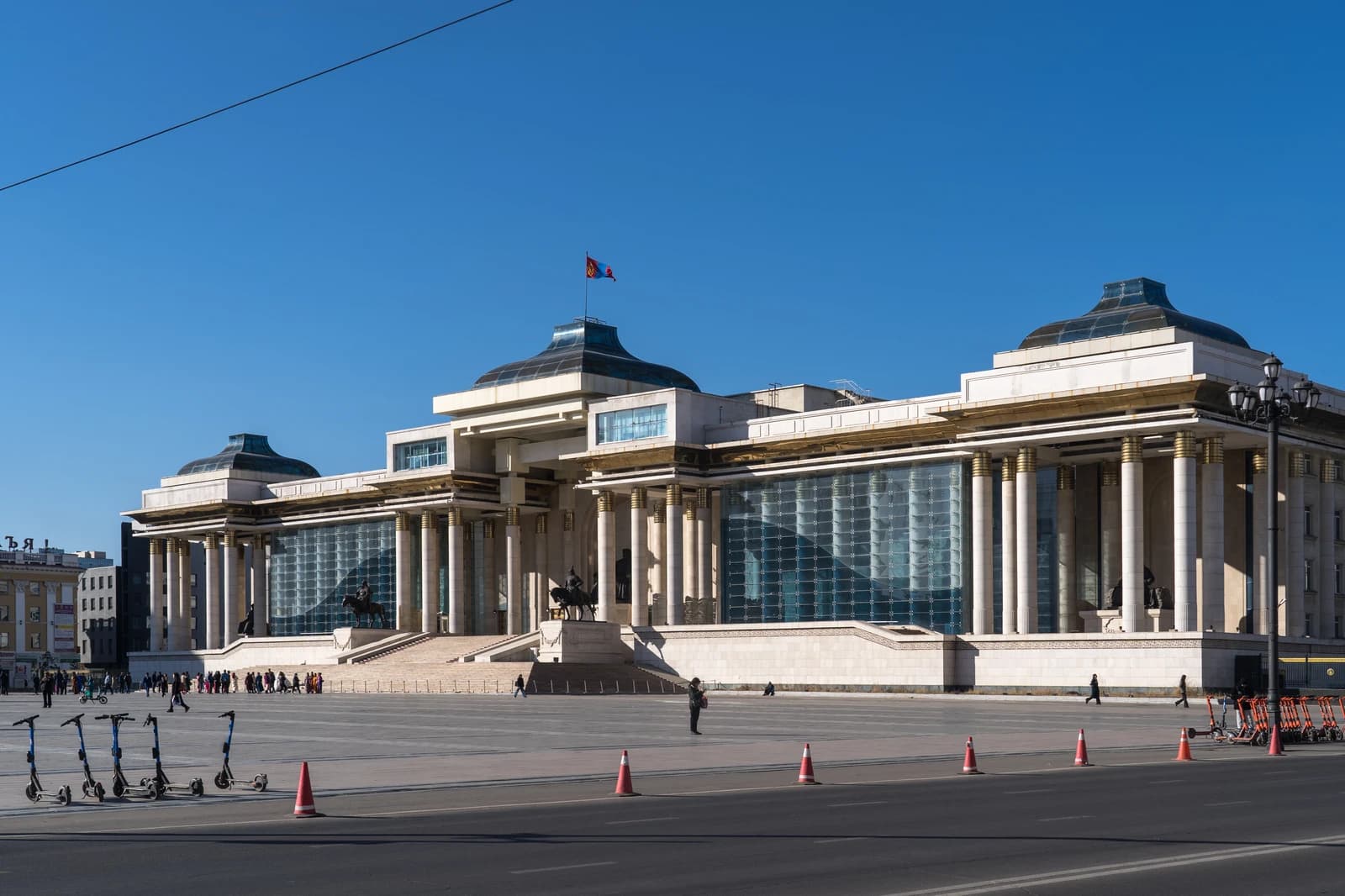 Government Palace building in Ulaanbaatar, Mongolia, with a clear blue sky.