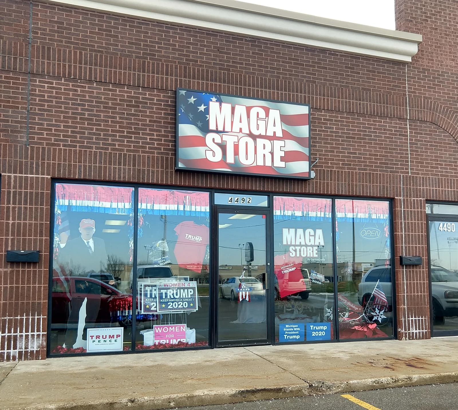 Exterior of a MAGA Store in Grand Rapids, Michigan with merchandise on display.