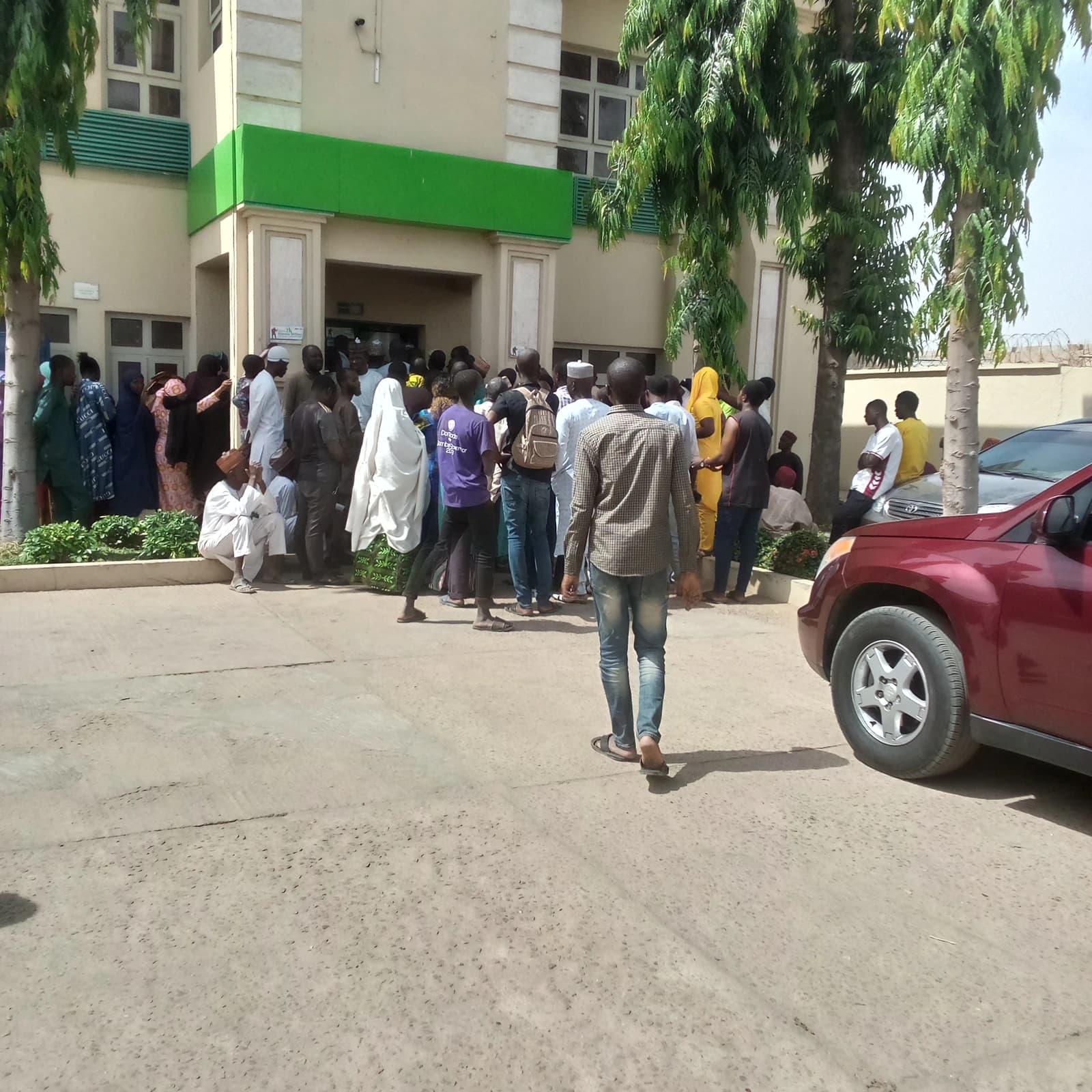 Customers lining up outside the entrance of Fidelity Bank in Gombe.