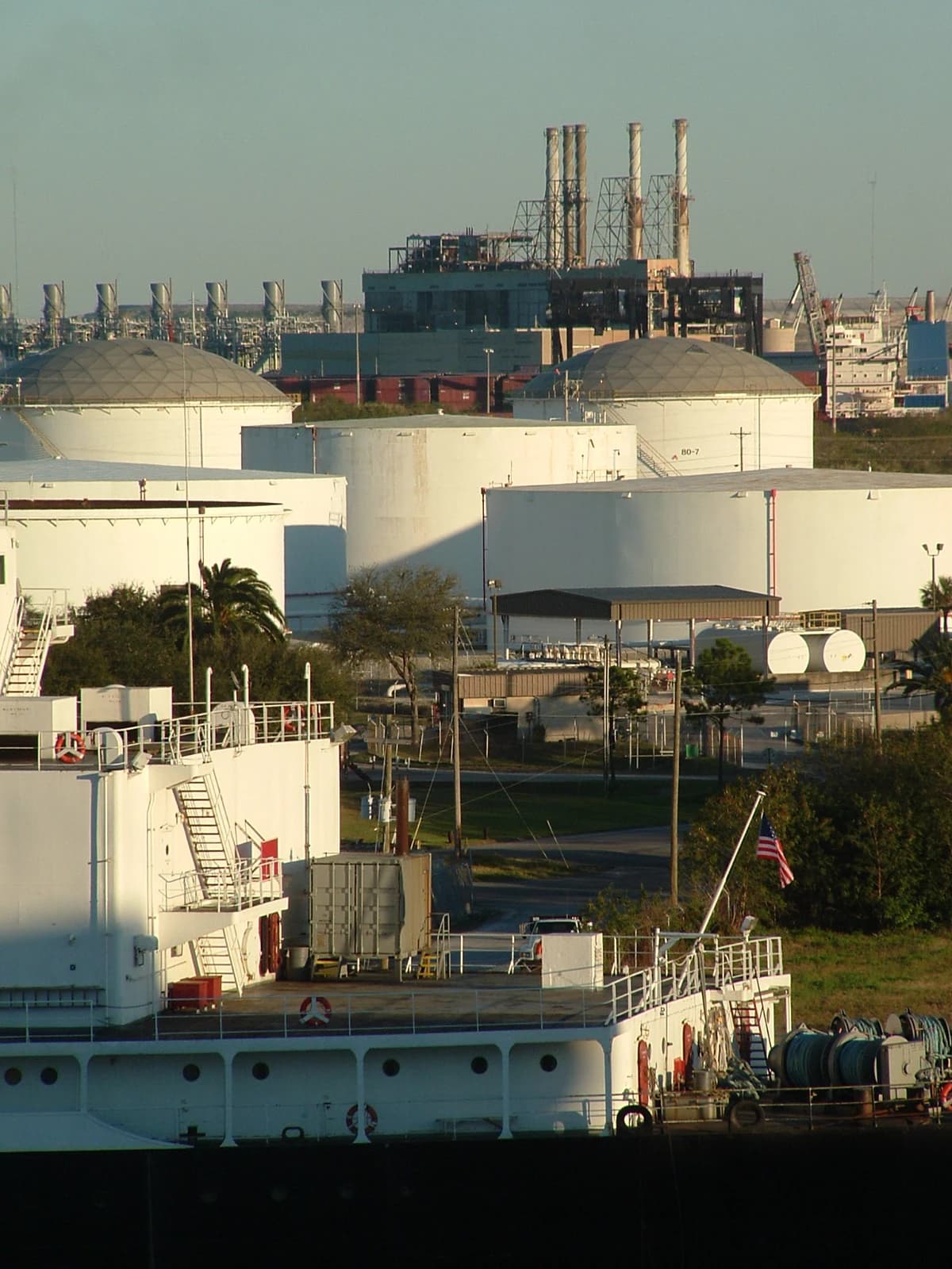 Petroleum storage tanks and industrial infrastructure near water in Tampa.