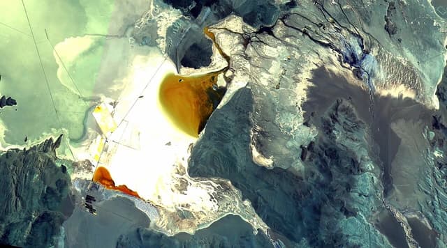 Aerial view shows large-scale lithium mining evaporation ponds in Salar del Hombre Muerto, Argentina.