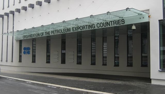Exterior of the OPEC headquarters building with its logo and name visible.