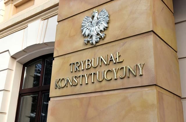 Signage for the Trybunał Konstytucyjny, Poland's Constitutional Tribunal, on a building facade.
