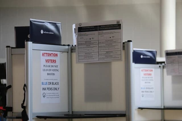 Voting booths with instructions displayed at a polling station in Washington D.C.