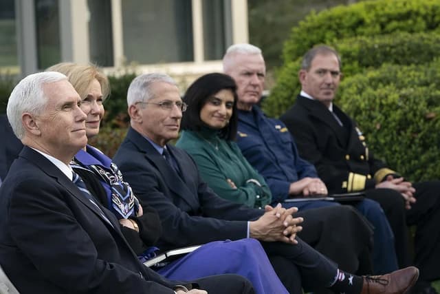 Anthony Fauci, Director of NIAID, sitting outdoors at a White House briefing.