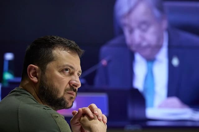 Ukrainian President Volodymyr Zelenskyy observing a G20 Summit address in November 2022.