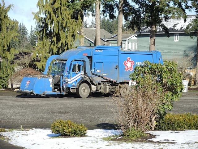 Republic Services garbage truck parked on a street in Kent, Washington.