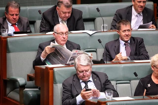 Members of the Australian Parliament attending a session in the House of Representatives.