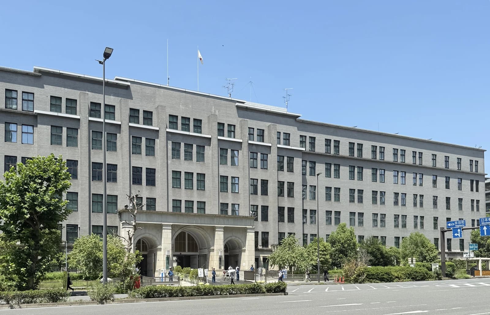 Exterior view of the grey, multi-story Ministry of Finance building in Tokyo, Japan.