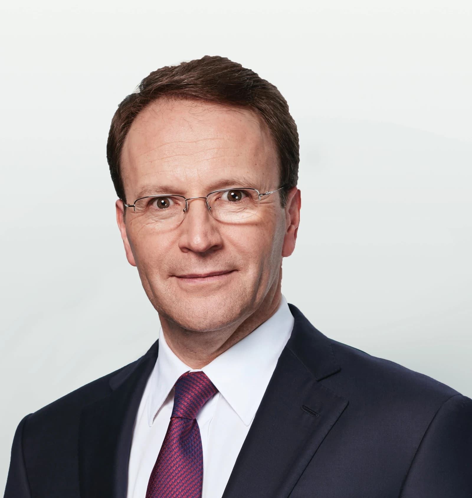 Ulf Mark Schneider, CEO of Nestle, poses for a professional headshot.
