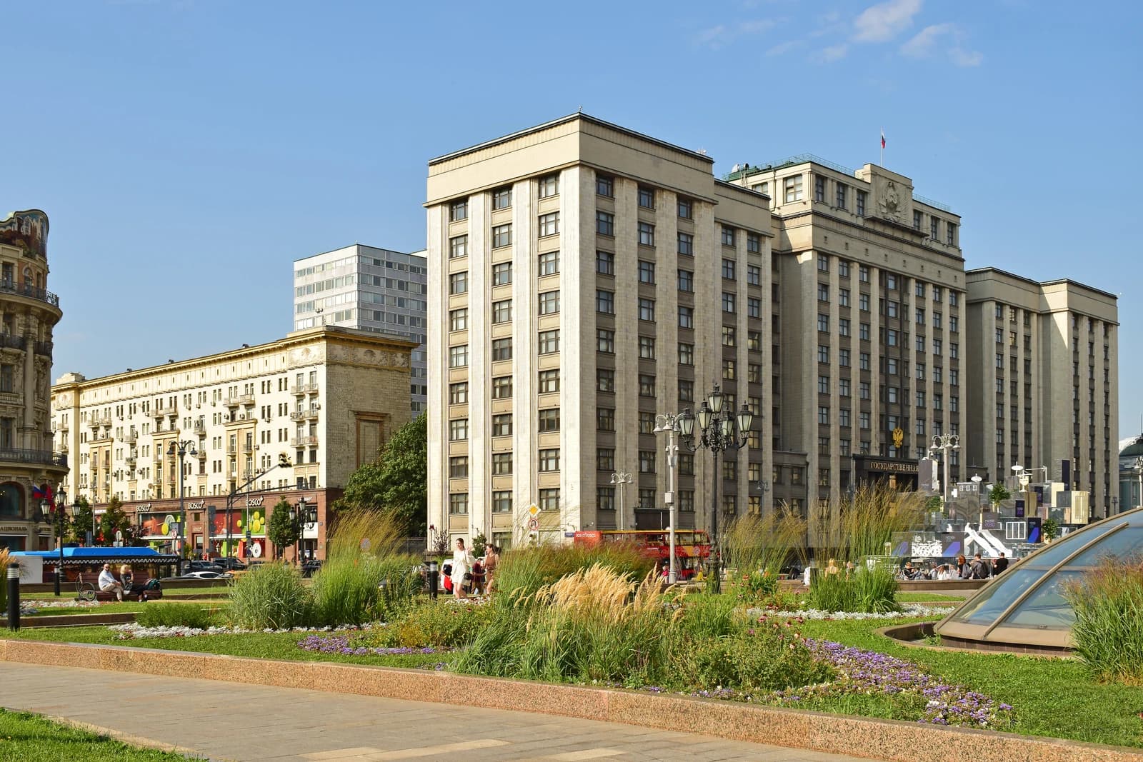 Exterior view of the imposing Russian State Duma building from Manezhnaya Square.