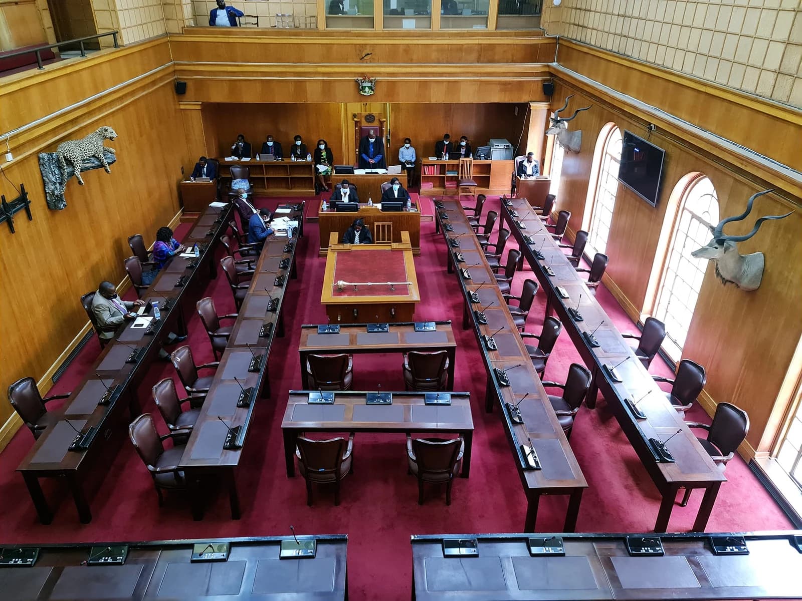 Interior of the Senate of Zimbabwe Chamber during a parliamentary session.