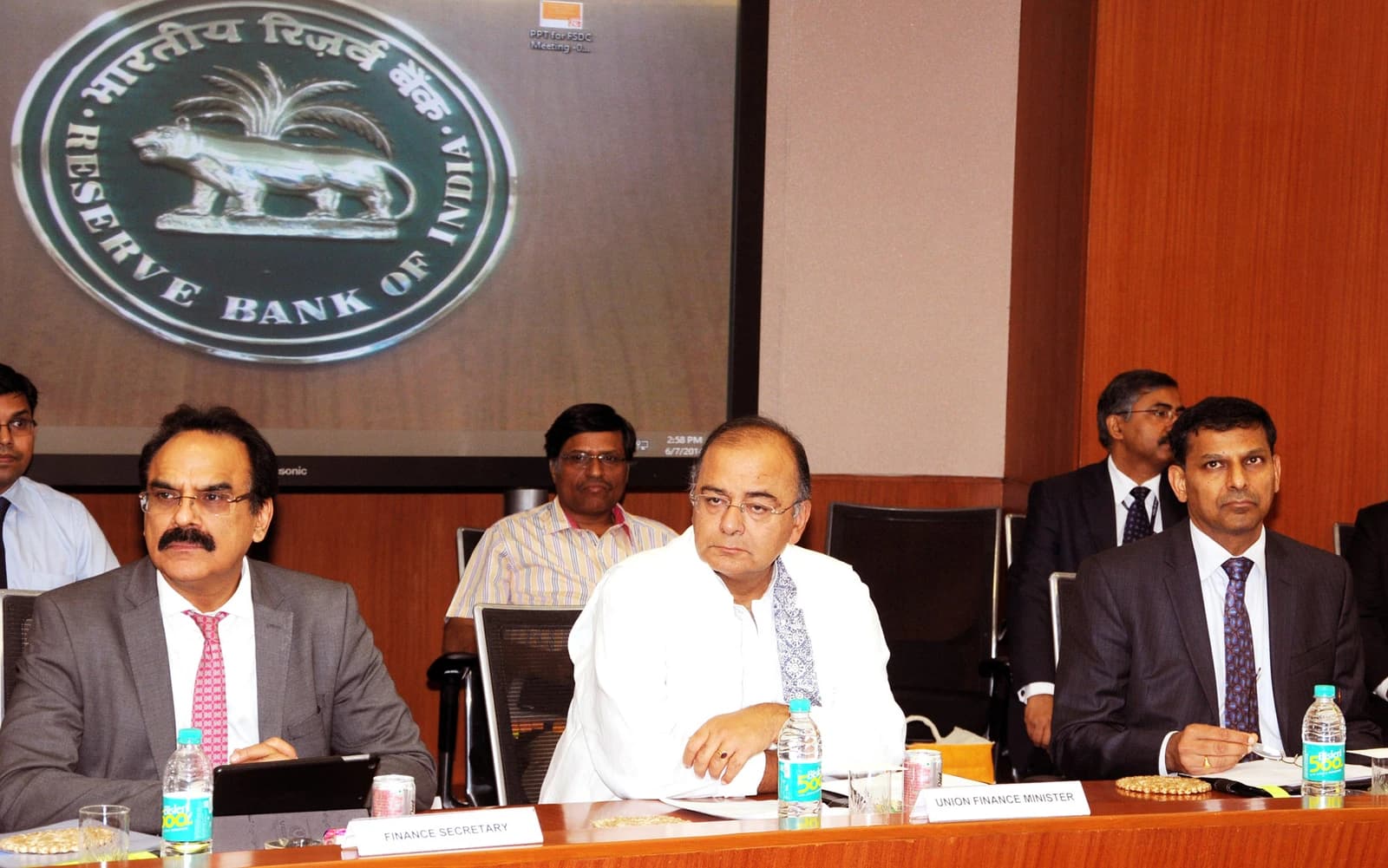 Union Minister Arun Jaitley and RBI Governor Raghuram Rajan attend a meeting in Mumbai.