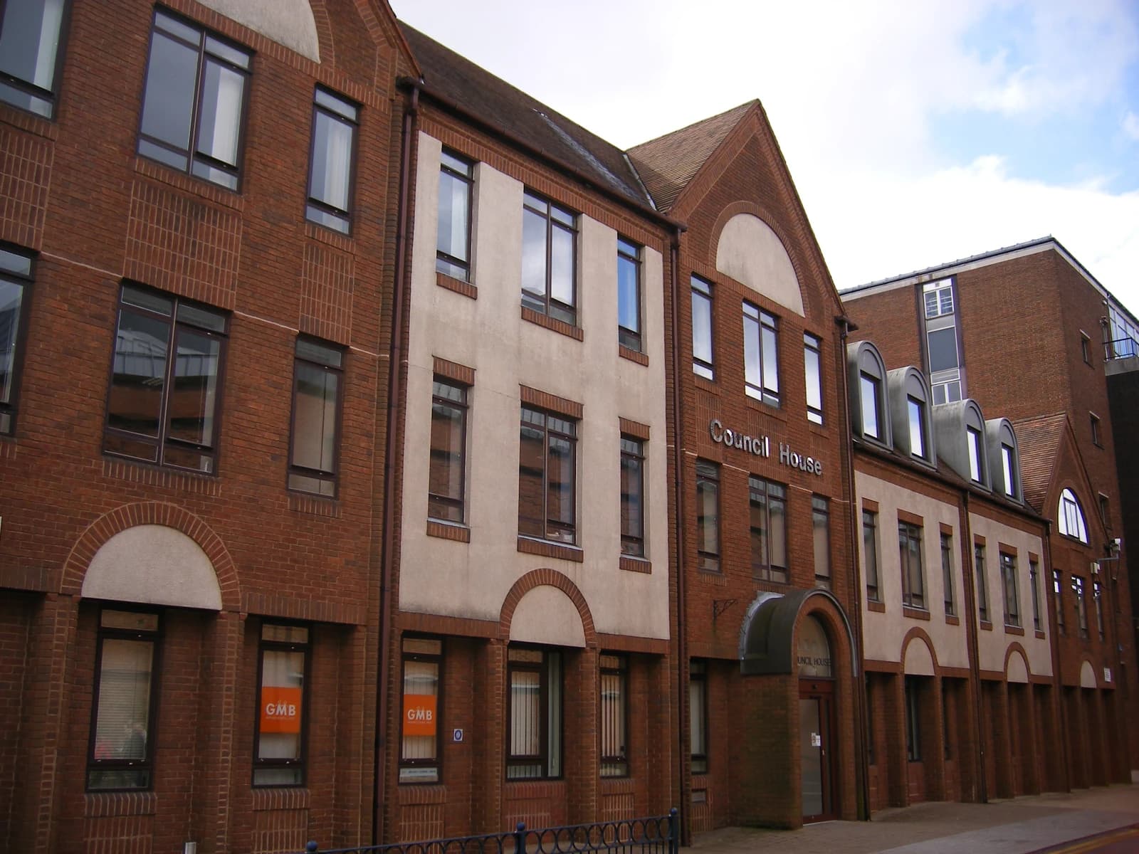 Exterior of the Solihull Council House, a brick building with several windows.