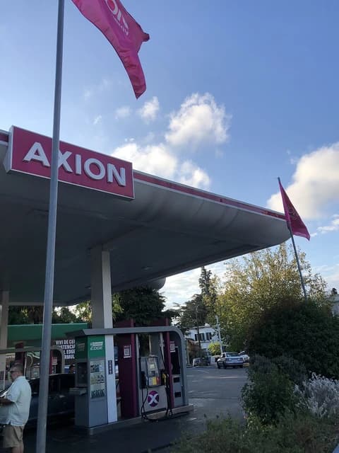 An Axion service station with the brand name visible on the canopy sign.