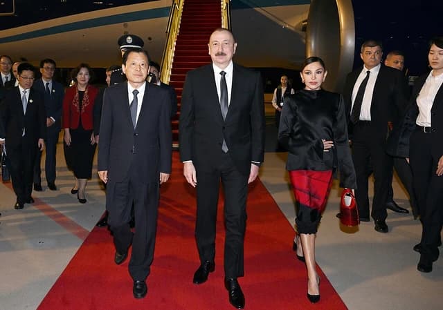 Ilham Aliyev, President of Azerbaijan, and Mehriban Aliyeva, First Vice-President, arriving on a red carpet.