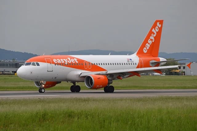easyJet Europe Airbus A319-111 aircraft, tail number OE-LQJ, at EuroAirport Basel Mulhouse Freiburg.