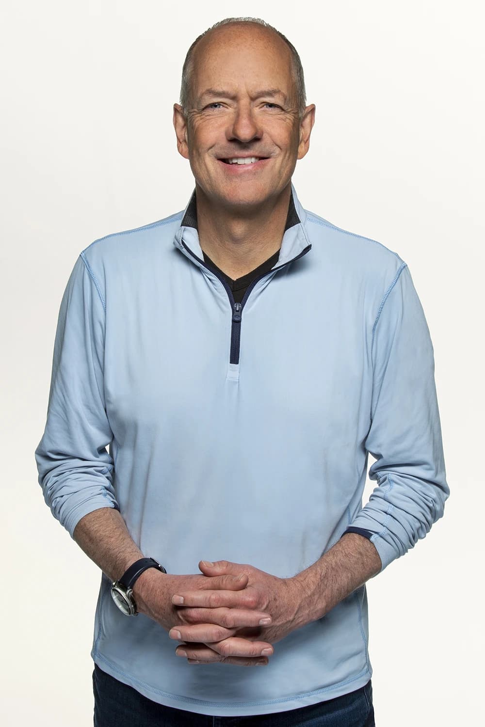 Andrew Witty, CEO of UnitedHealth Group, smiling directly at the camera.