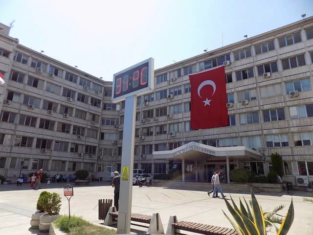 Exterior view of the Samsun Metropolitan Municipality building under a bright sky.