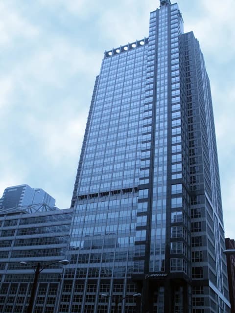 Boeing International Headquarters building, a tall glass and steel skyscraper.