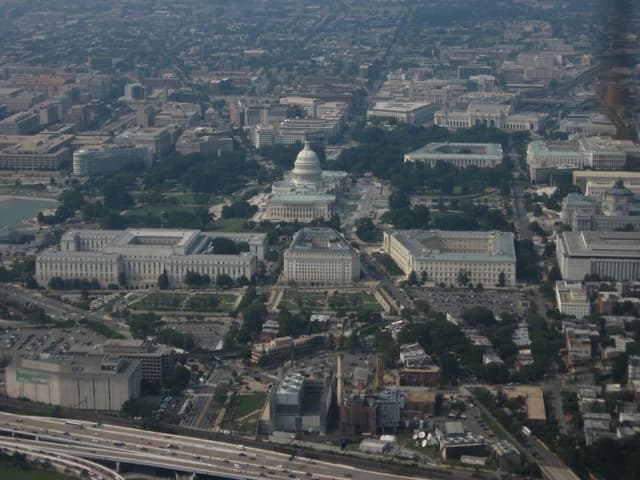 Aerial view of the U.S. Capitol Building and surrounding House Office Buildings.