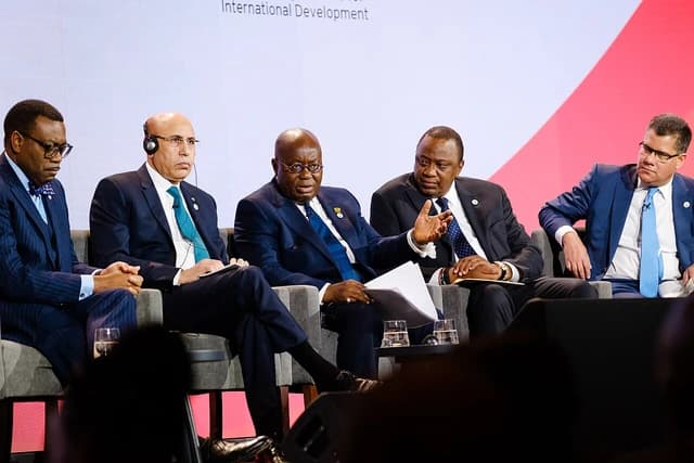 African and international leaders seated on a panel at the UK-Africa Investment Summit.