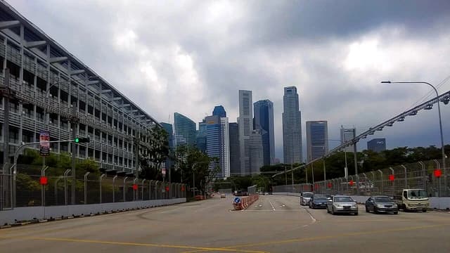 View south down Nicolls Highway to the Singapore Financial District skyline.