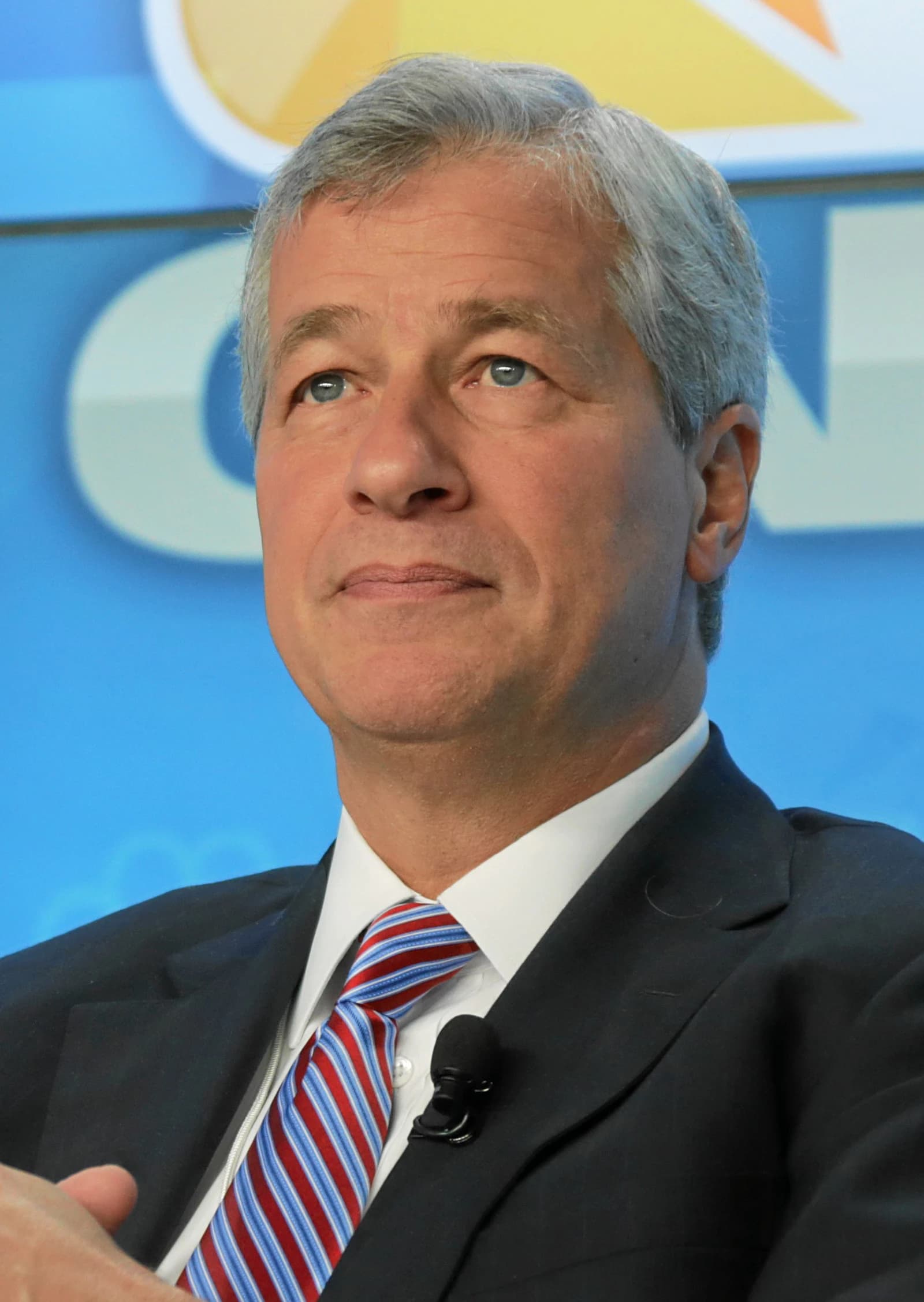 James Dimon, CEO of JPMorgan Chase, looking slightly upward at an event.