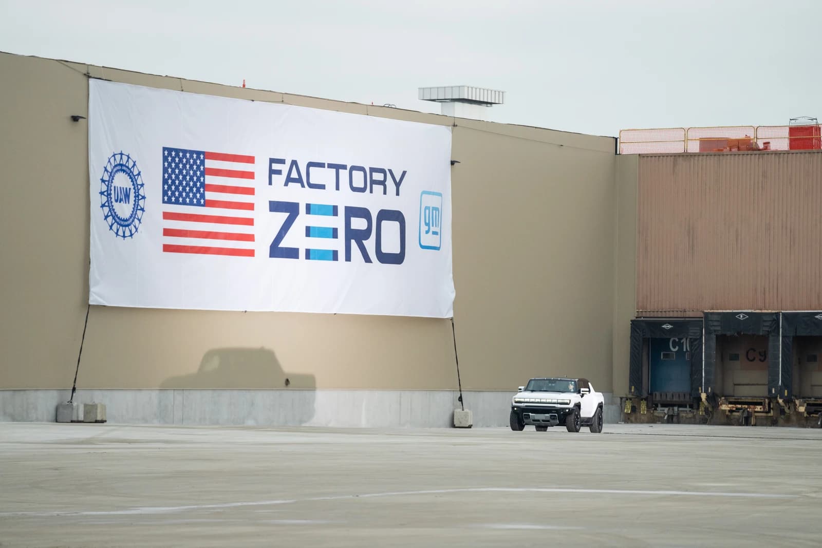 GMC Hummer EV parked in front of General Motors Factory ZERO plant in Detroit.
