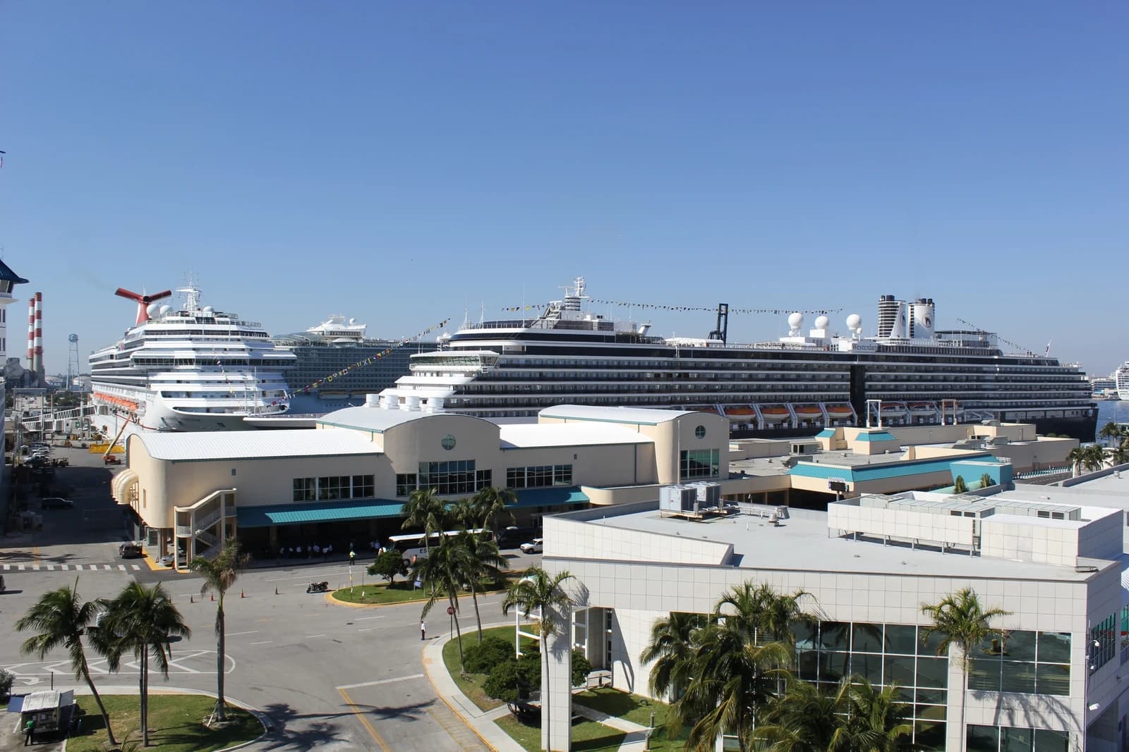 Cruise ships docked at a large terminal in Port Everglades, Miami.