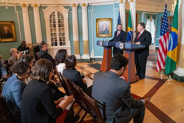 U.S. Secretary of State Michael R. Pompeo and Brazilian Foreign Minister Ernesto Araújo standing at podiums.