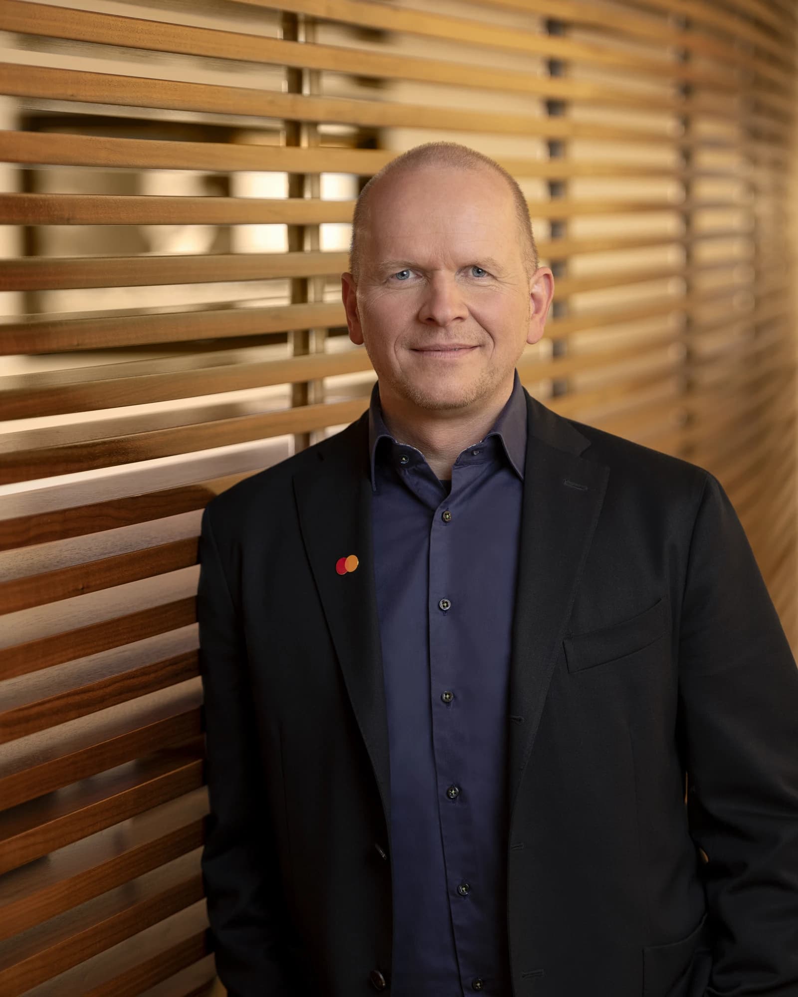 Michael Miebach, CEO of Mastercard, stands in a professional setting.