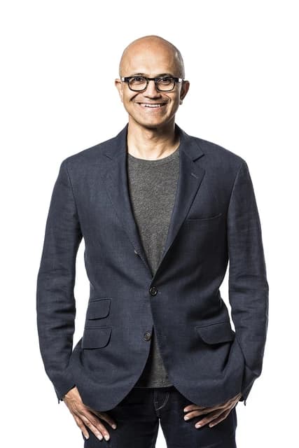 Satya Nadella, CEO of Microsoft, standing with his hands in his pockets.