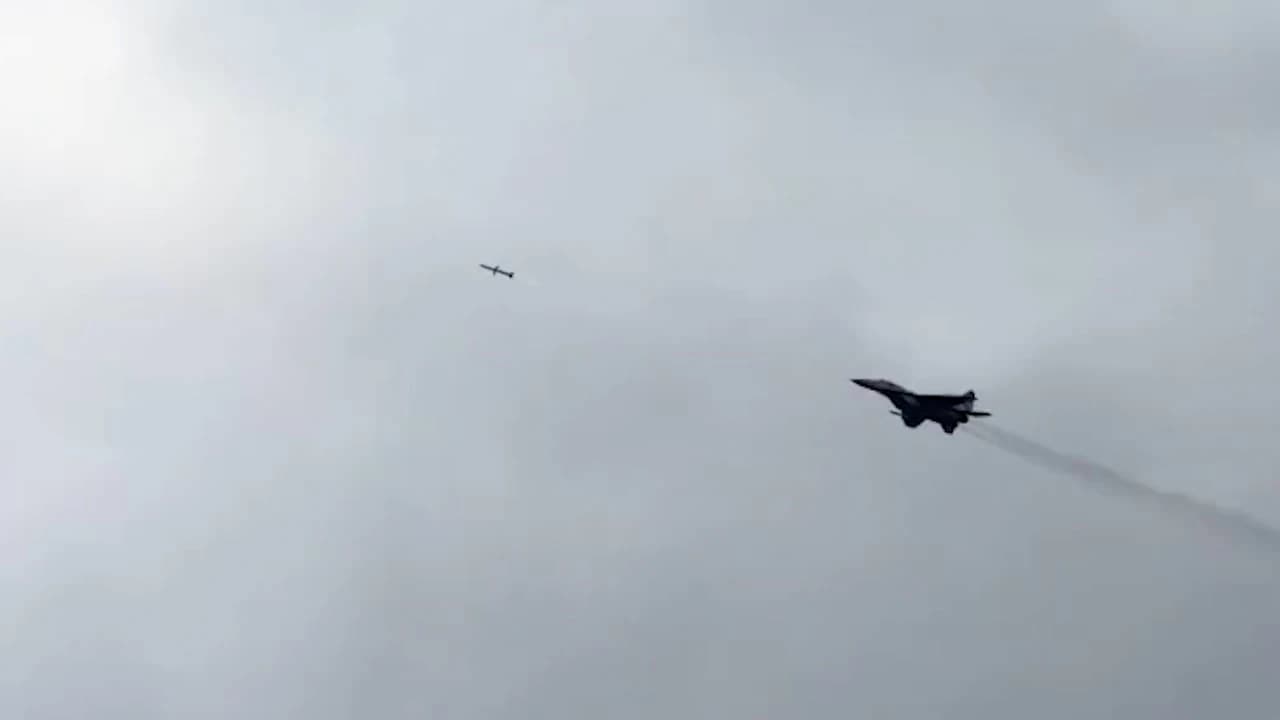 Ukrainian Air Force MiG-29 fighter jet firing an AIM-7 Sparrow missile.