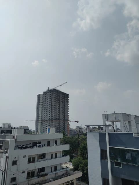 Trident Apartments by Namishree Infra under construction in an urban setting.