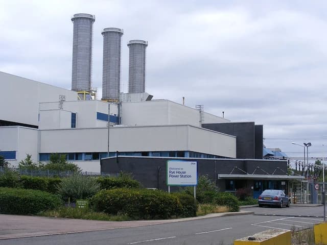 Rye House Gas Turbine Power Station building with three tall exhaust stacks.
