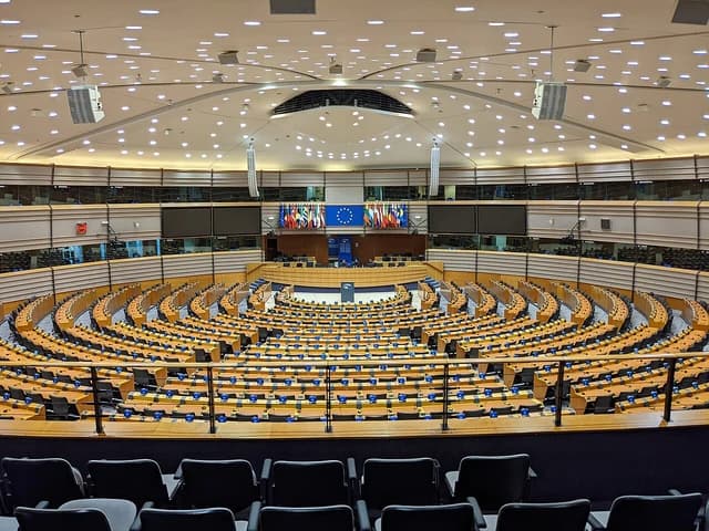 Interior of the European Parliament Hemicycle in Brussels, Belgium.