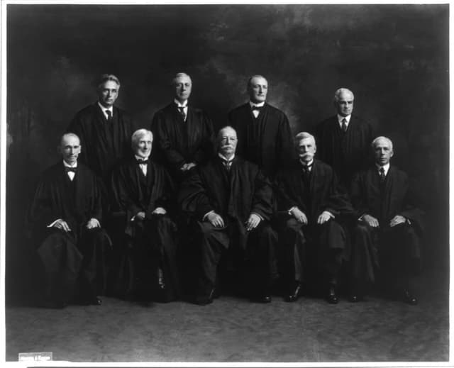 Nine U.S. Supreme Court justices from 1921 in judicial robes, posing for a group portrait.