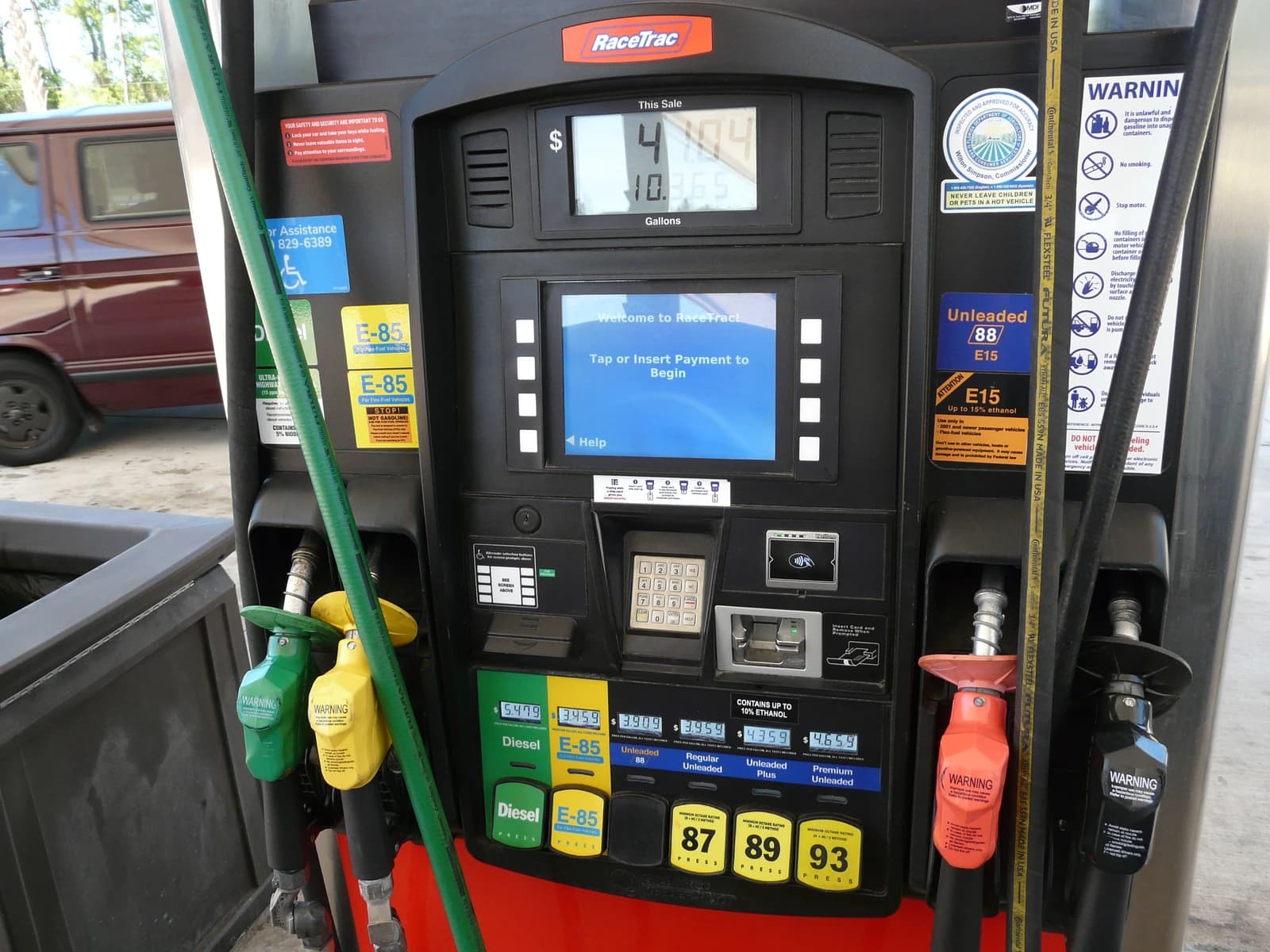 Close-up of a gas pump at a RaceTrac station, showing fuel options.