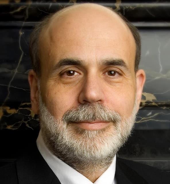 Ben Bernanke, former Chairman of the Federal Reserve, looking directly at the camera.