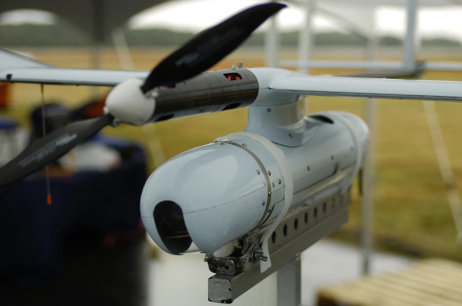 Close-up of a Skylark 1 unmanned aerial vehicle with propeller and sensor payload.
