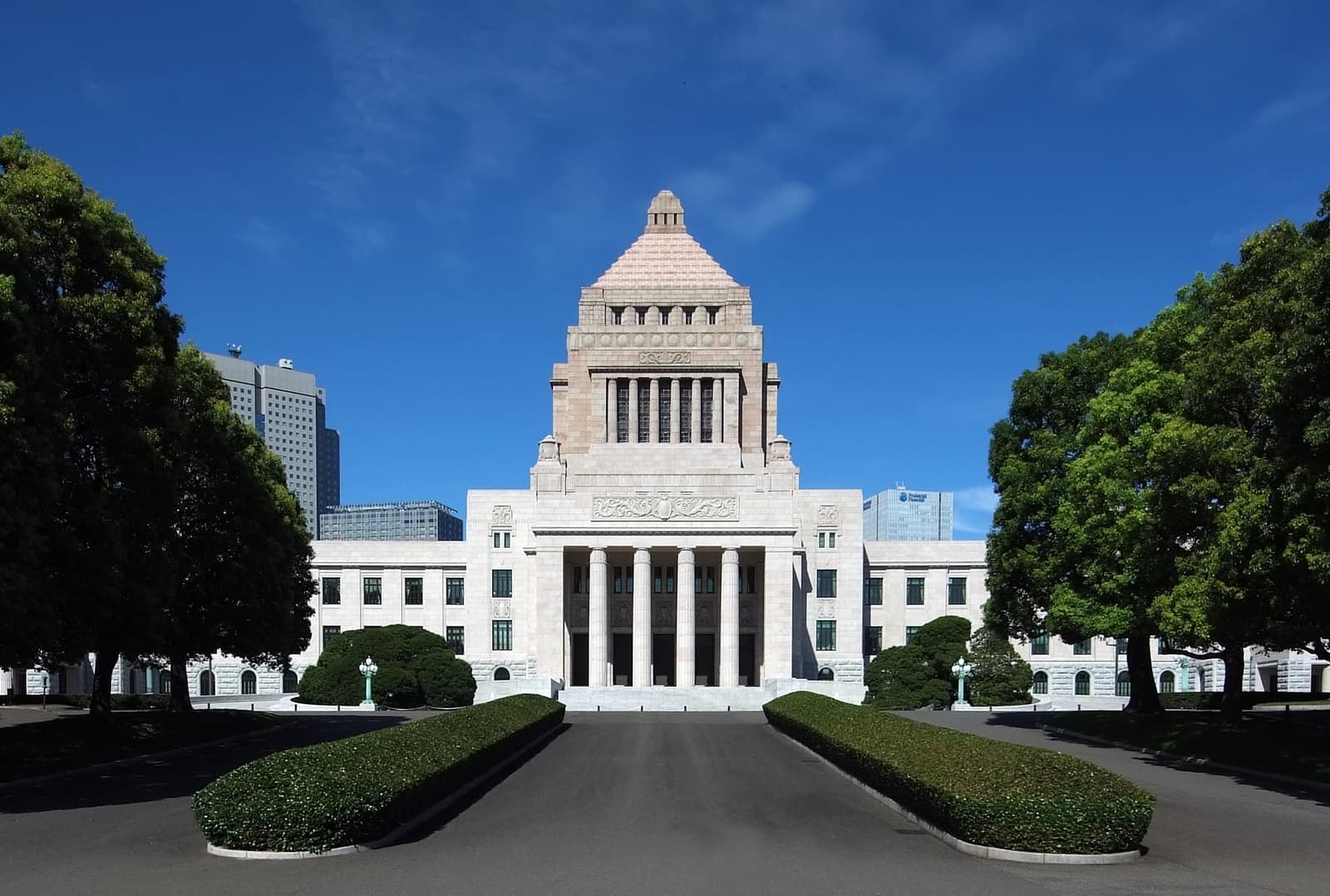 National Diet Building in Tokyo, Japan, with a driveway leading to its entrance.