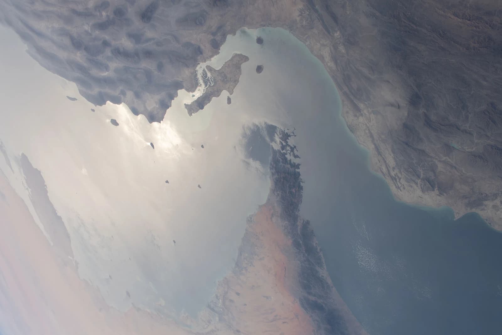 Aerial photograph shows the Strait of Hormuz, connecting the Persian Gulf and the Gulf of Oman.